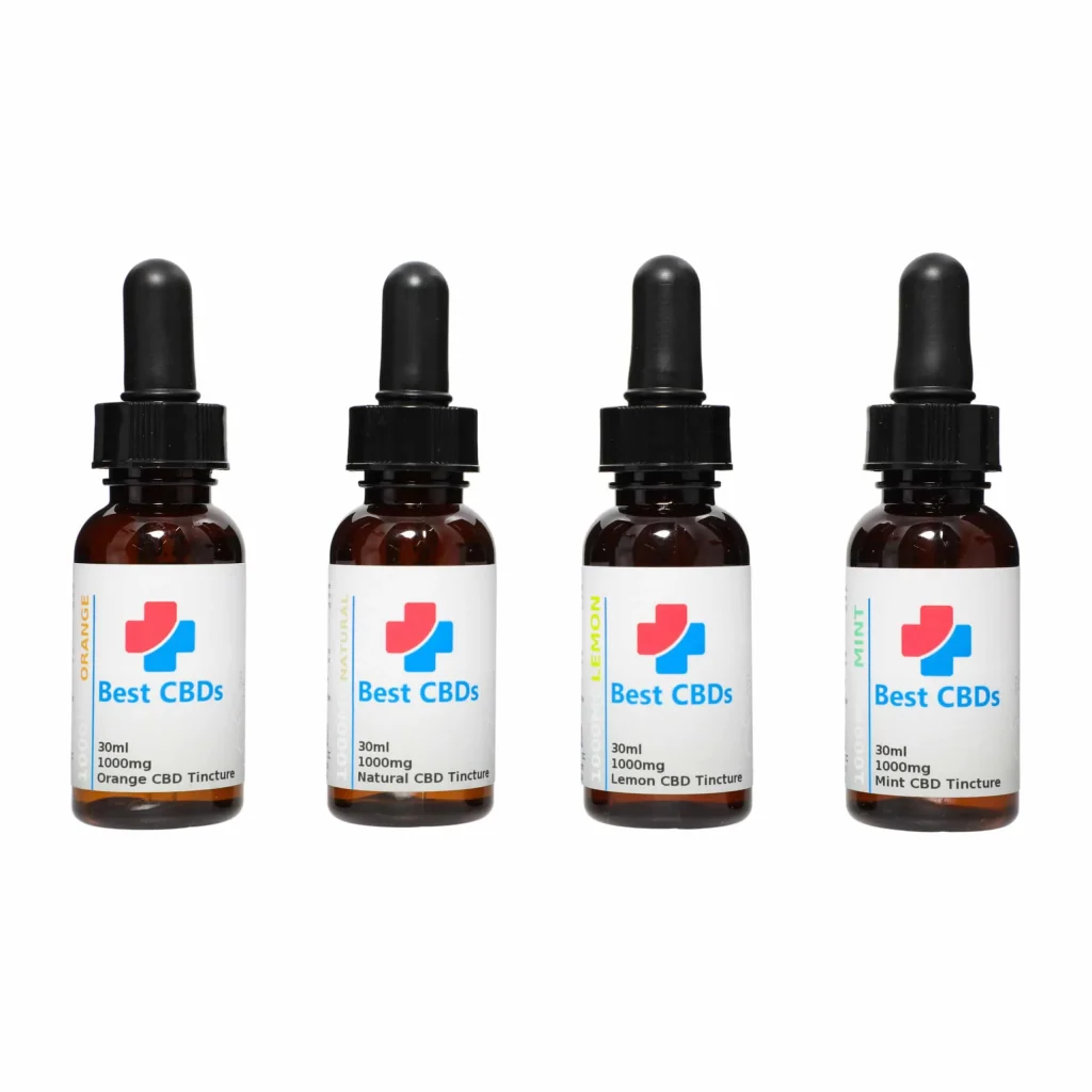 A group of four bottles with different flavors.